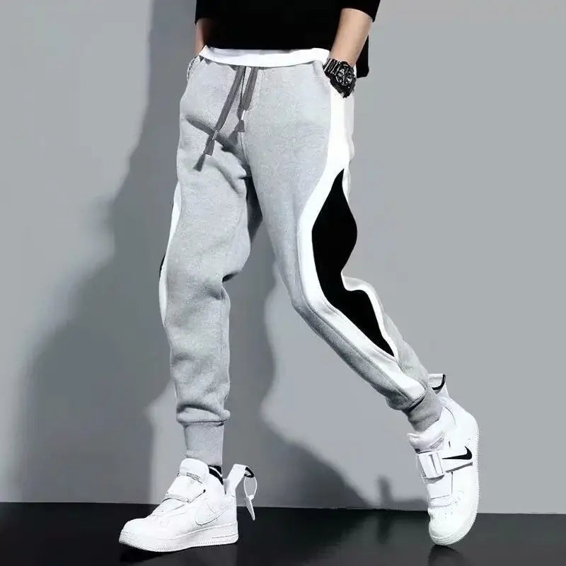 NevoMart Men’s Sports Pants Loose-Fitting Patchwork Running and Training Trousers for Casual Fashion Wear
