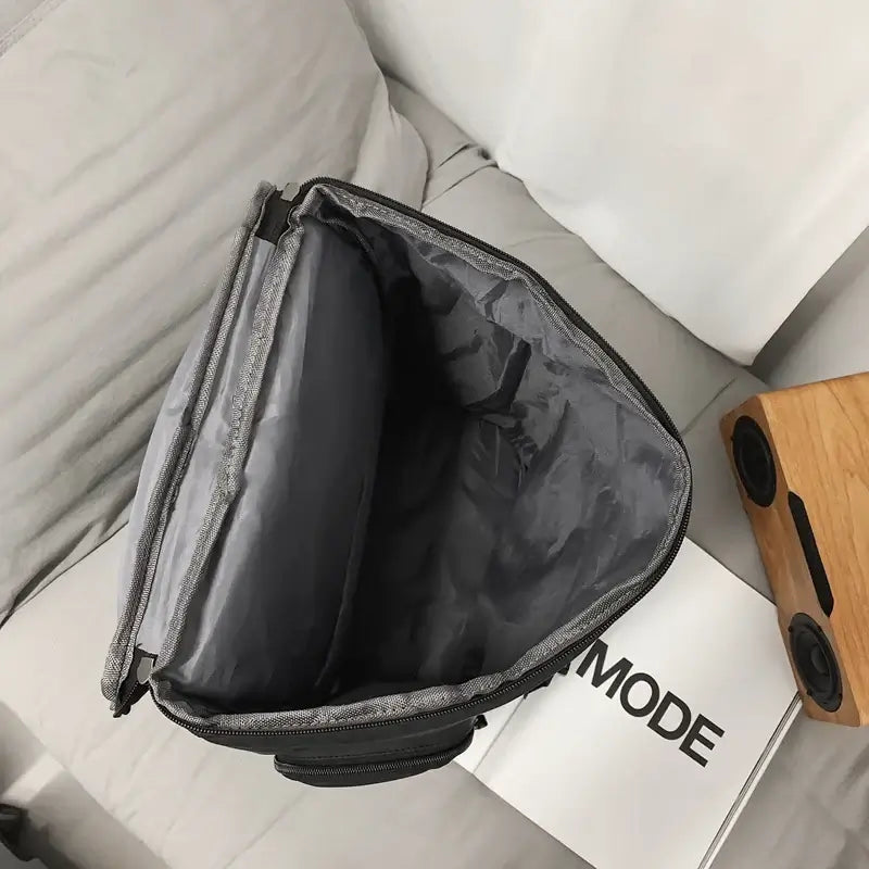 NevoMart trendy large-capacity travel backpack for men, women, and students